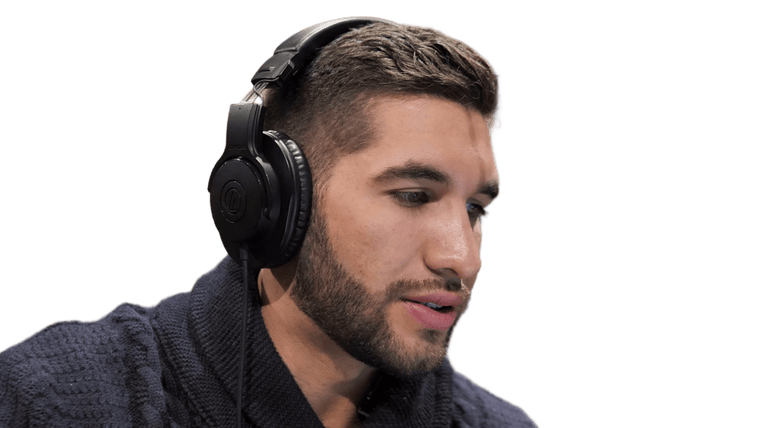 Processed frame: the same host isolated with transparent pixels; the microphone is removed