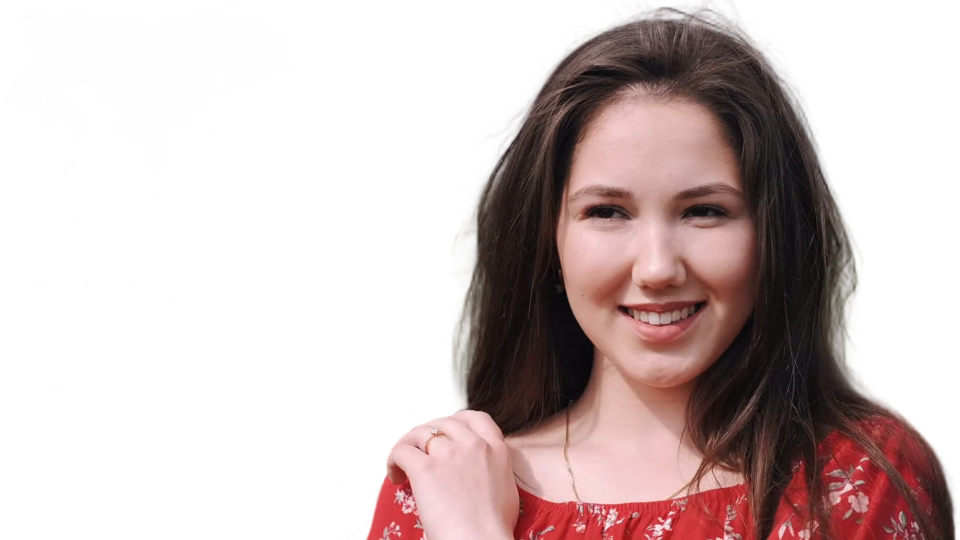 Processed frame: the same woman isolated with transparent pixels around her